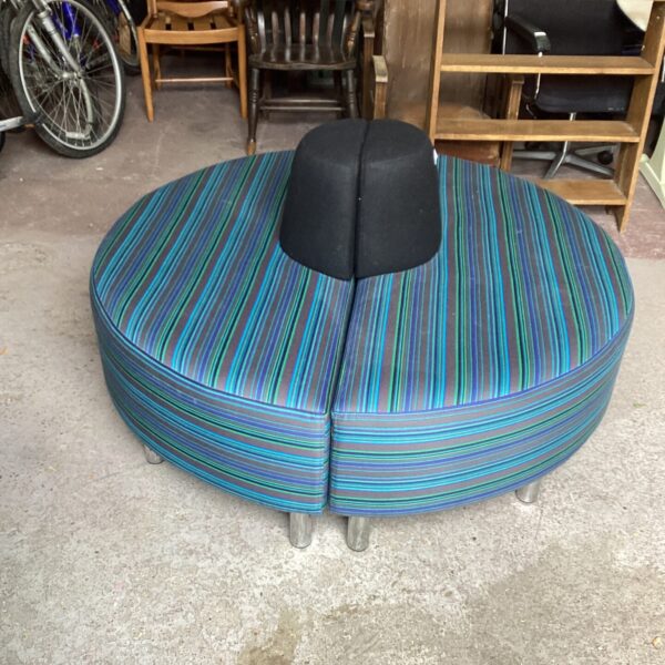 Vintage Round Central Portfolio Sofa with colourful stripes.