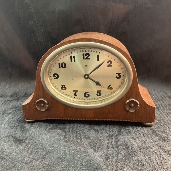 Vintage Haller mantle clock with Art Deco design.