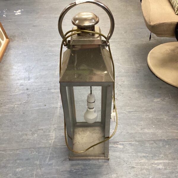 Large metal lantern lamp with vintage industrial style.