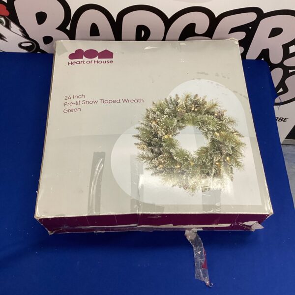 Green 24-inch pre-lit snow-tipped Christmas wreath for holiday decor.