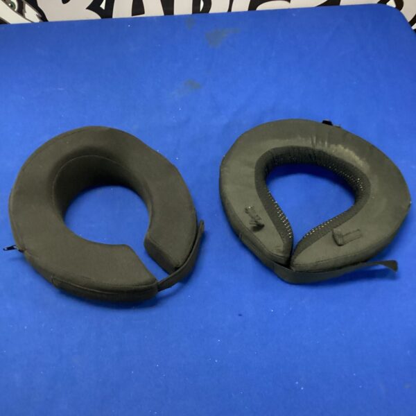 Two XTRM racing neck braces for motorsport safety.
