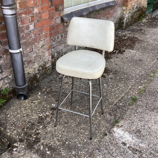 Vintage chrome kitchen stool with high back.