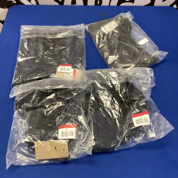 New golf polo shirts lot including Nike and Adidas brands.