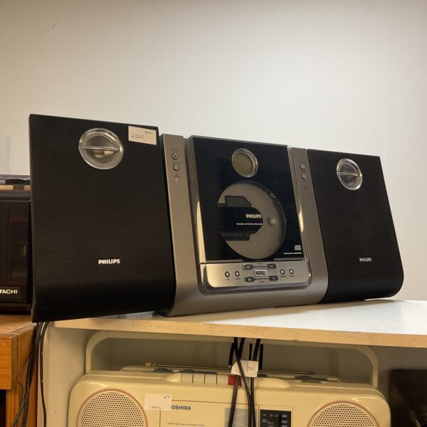 Vintage Philips micro hifi system with two speakers and central unit.
