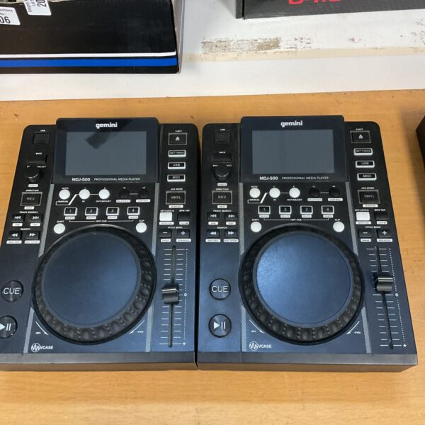 Pair of used Gemini MDJ-500 DJ media players for professional DJs.
