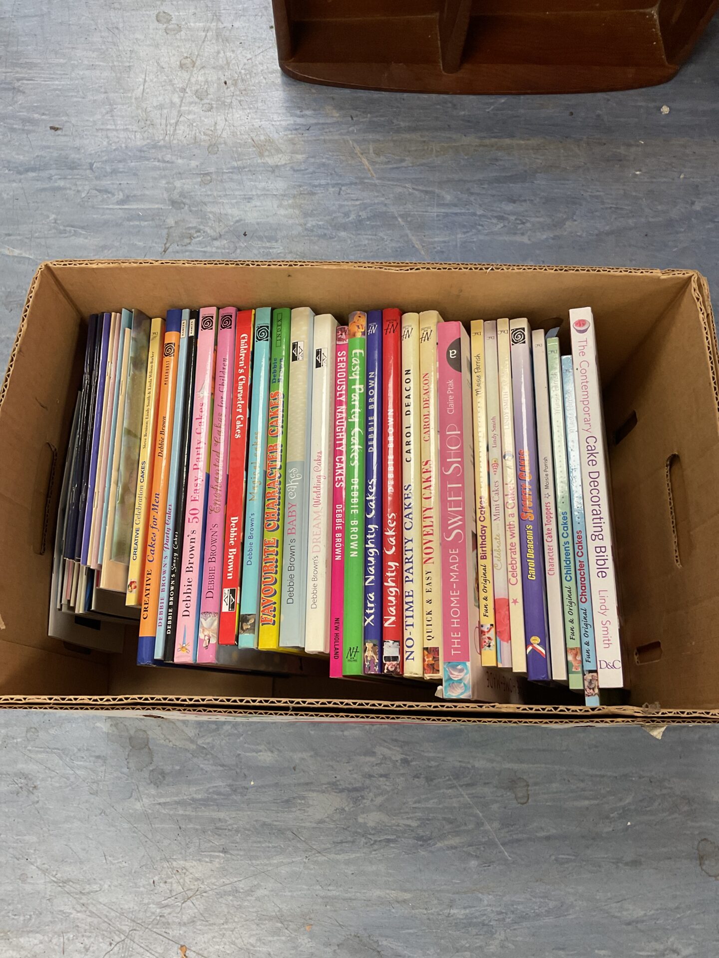 598 Box full of cake making cookery books