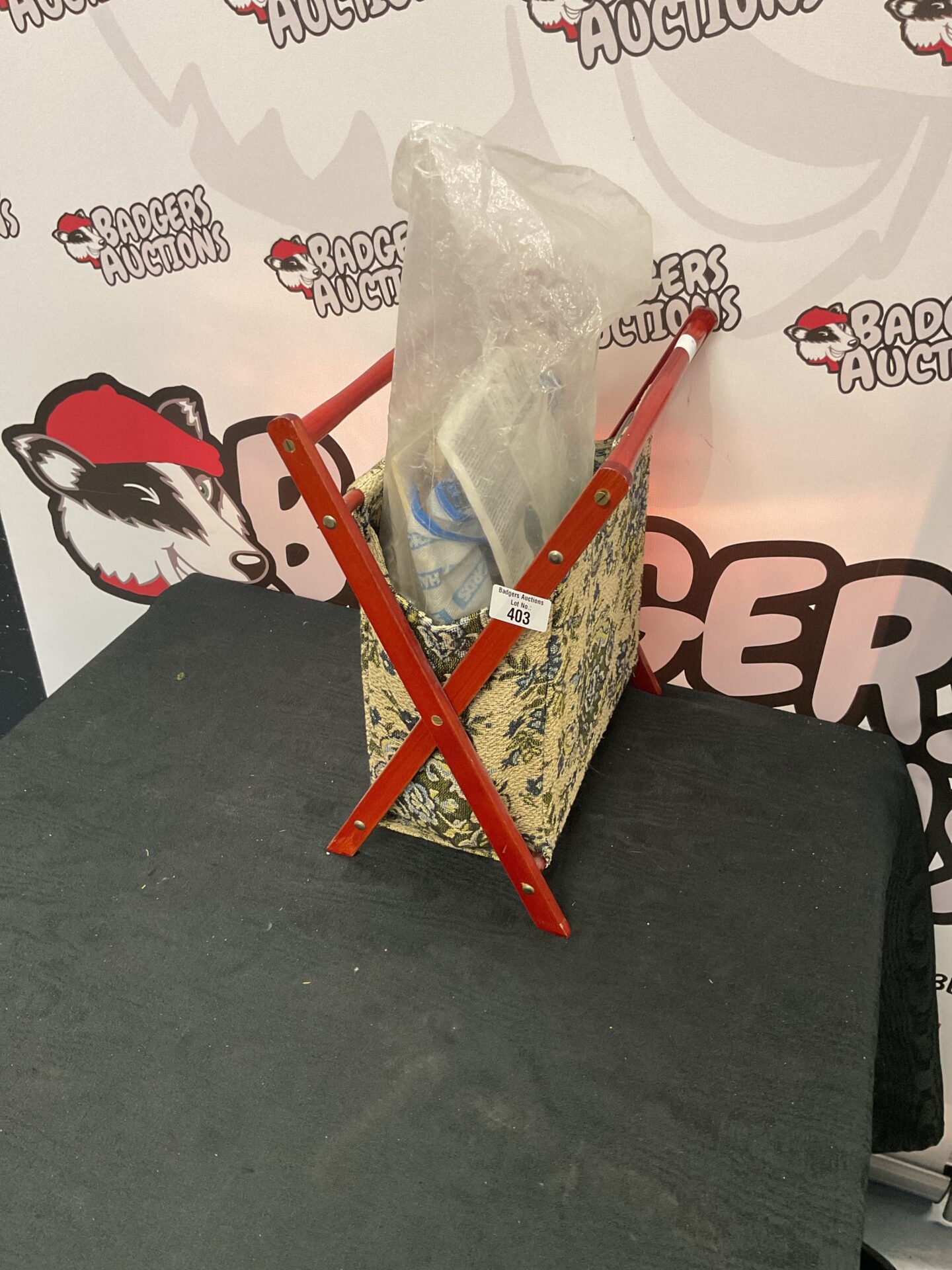 413 Magazine rack holder with contents
