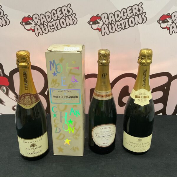 Champagne bottles including Moet & Chandon and Laurent Perrier in a collection.