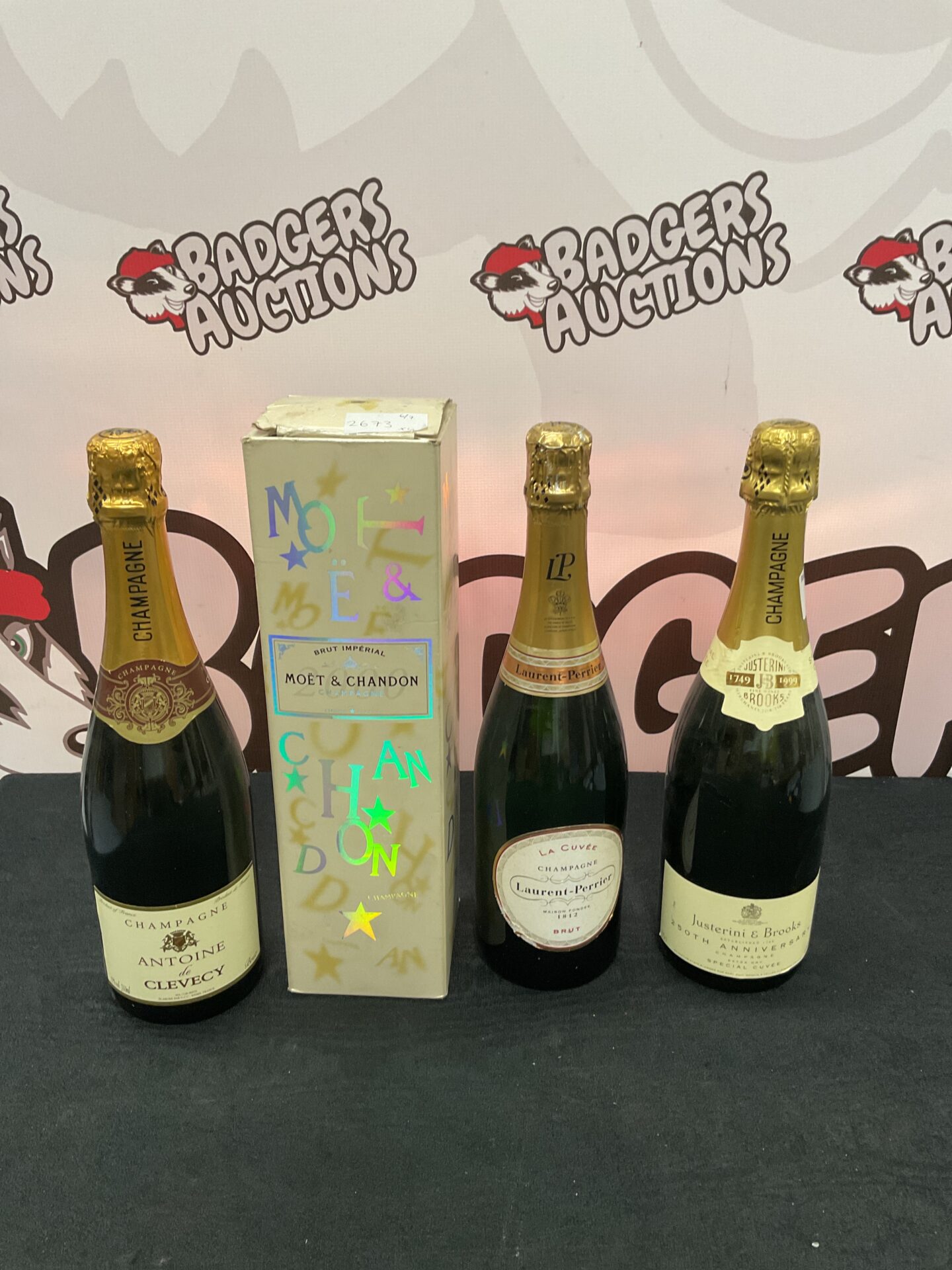 664 Four bottles of champagne including moet chandon & laurent perrier