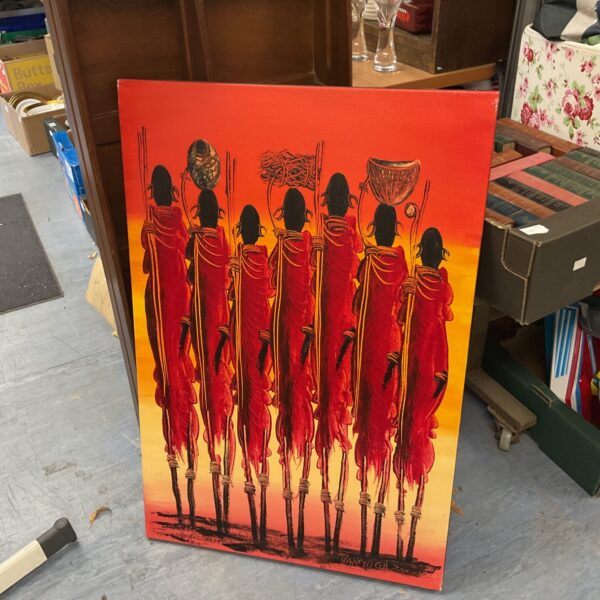 Colourful canvas print of African warriors in a tribal style.