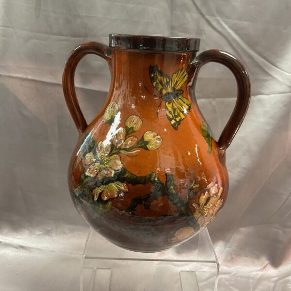 West Country studio pottery vase with vibrant floral design.