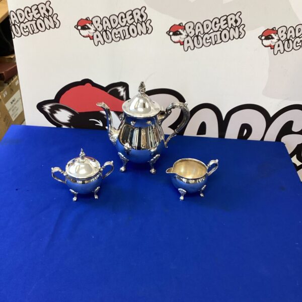 Vintage Viners silverplate coffee set with teapot, sugar bowl, and creamer.