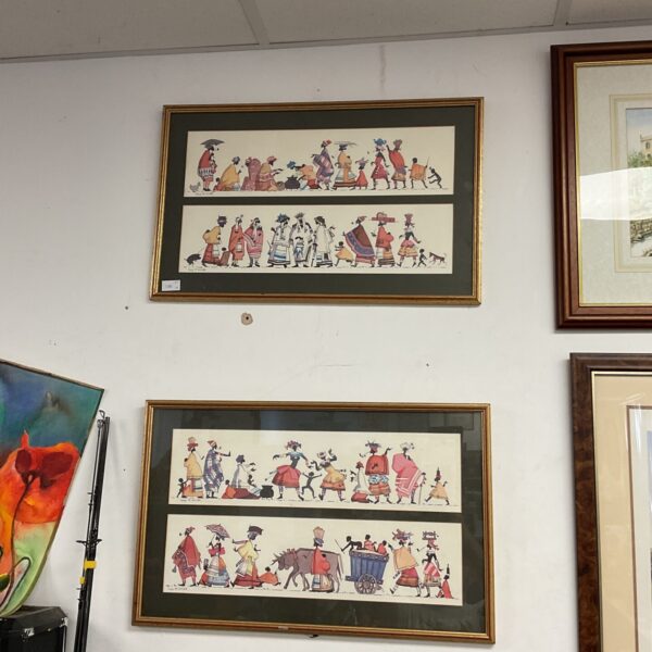 Set of four framed Lucy M Wiles African tribal life prints.