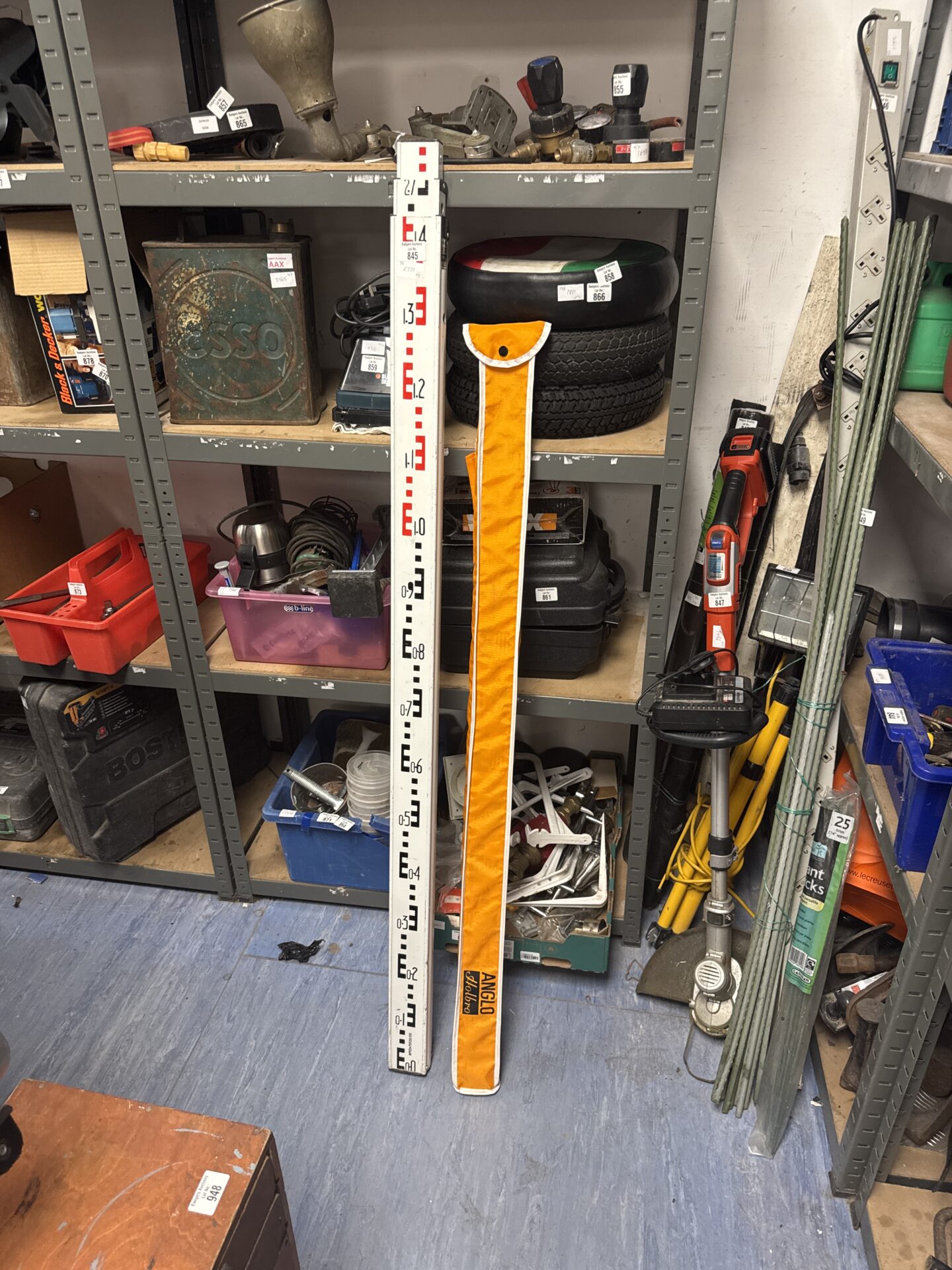 845 Two telescopic surveyor measuring rods
