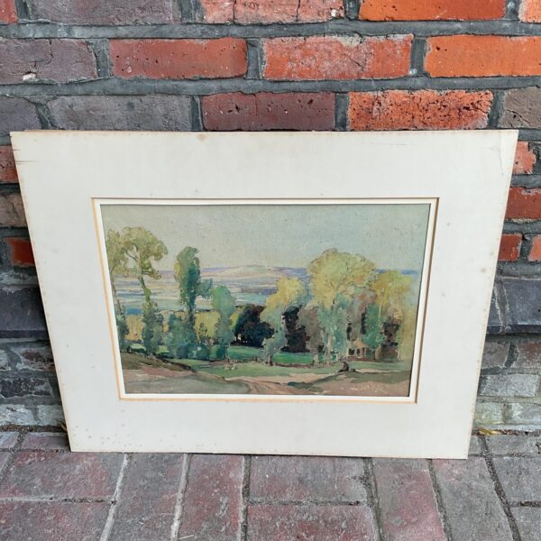 Early 20th century watercolour landscape painting with trees.