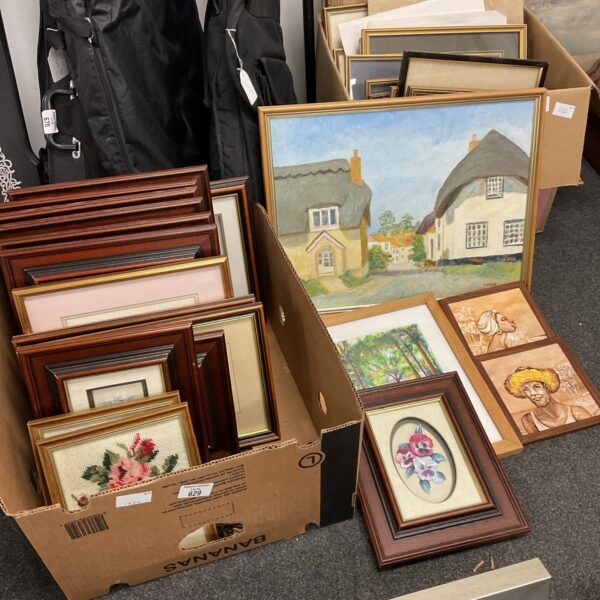 Mixed lot of framed artworks and vintage prints for wall decor.
