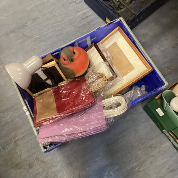 House clearance lot with decorative robin and picture frames.