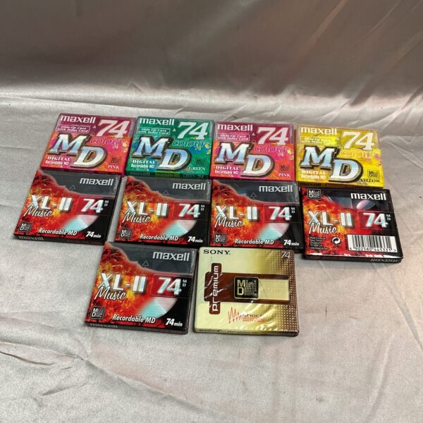 Sealed lot of Maxell and Sony mini discs for digital audio storage.