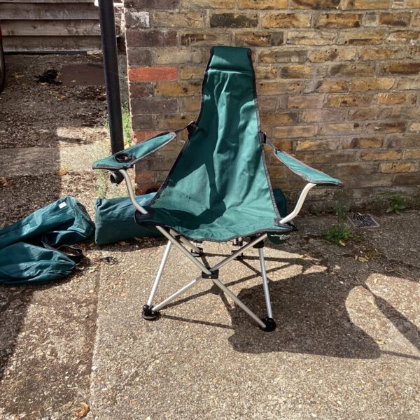 Lot of two folding camping chairs for outdoor use.