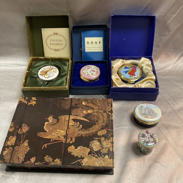 Halcyon Days enamel pill pots and papier mache box collection.