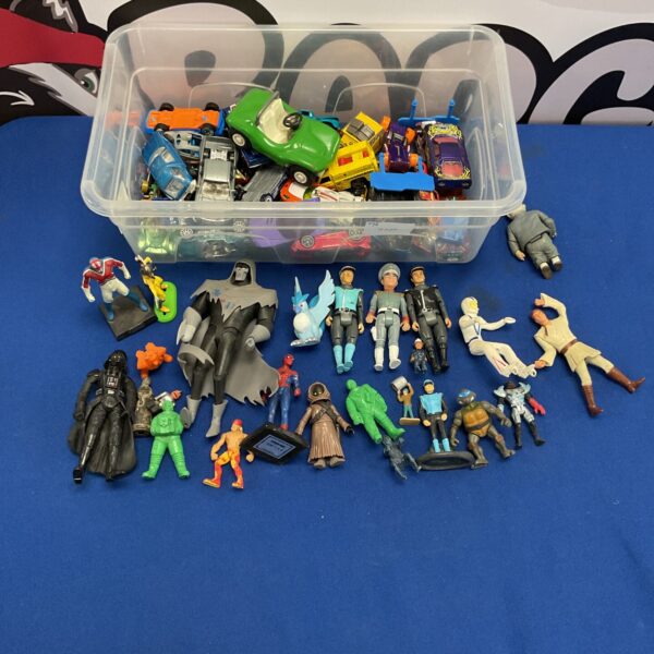 Mixed lot of diecast models and retro action figures for collectors.
