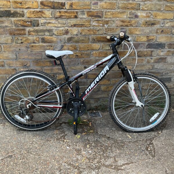 Used Merida Dakar 524 mountain bike for off-road cycling.