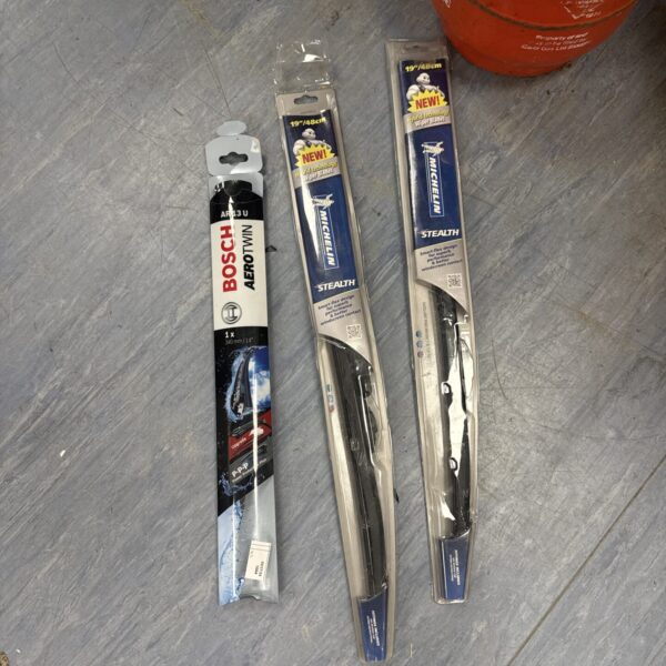 New Michelin wiper blades in original packaging for vehicle maintenance.