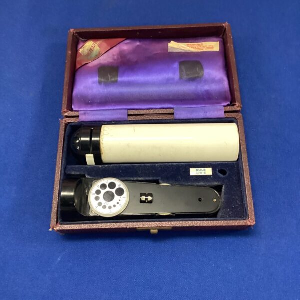 Vintage Keeler optometer for vision testing, detailed scale visible.