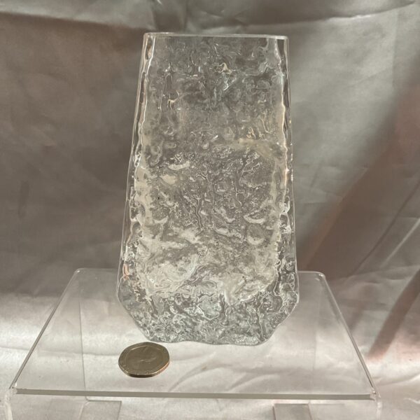 Whitefriars Geoffrey Baxter clear glass vase with bark texture.