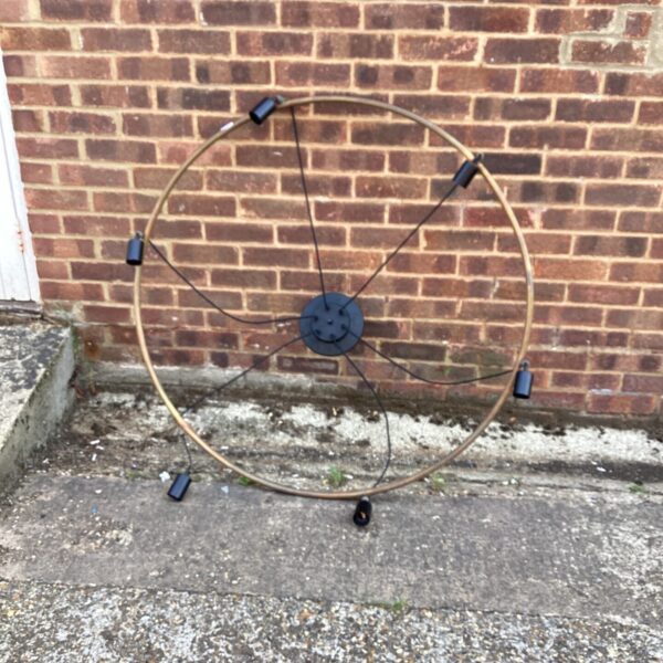 Vintage round ceiling light with multiple arms.
