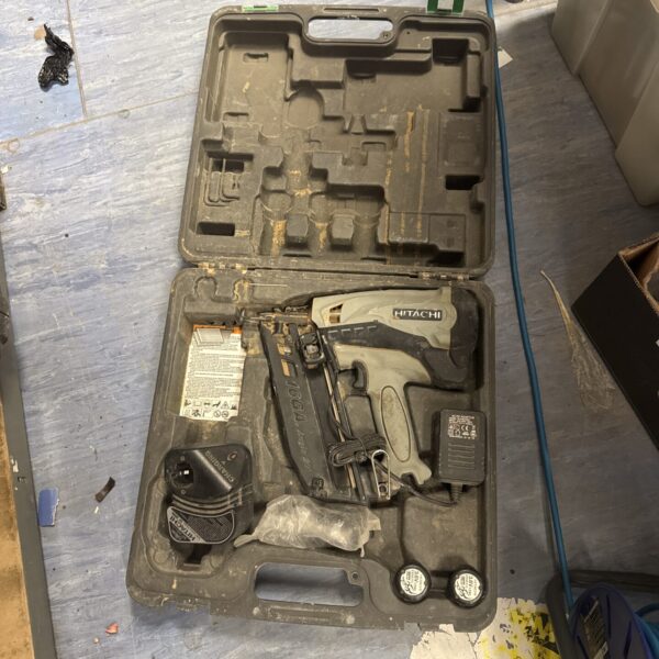 Hitachi NT65MA5 industrial stapler in carrying case for spares or repairs.