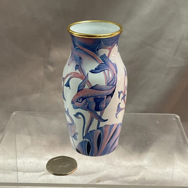 Moorcroft limited edition carp vase with detailed fish design.