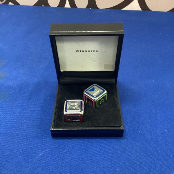 Vintage lovers dice set in a fitted case for fortune telling.