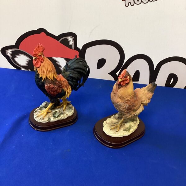 Pair of ceramic chickens from the Leonardo Collection, farmhouse style.