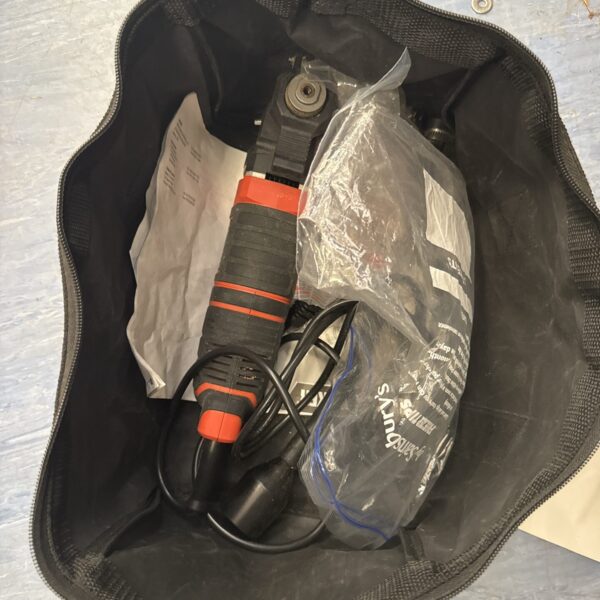Black and Decker MT280 multi tool in a storage bag.