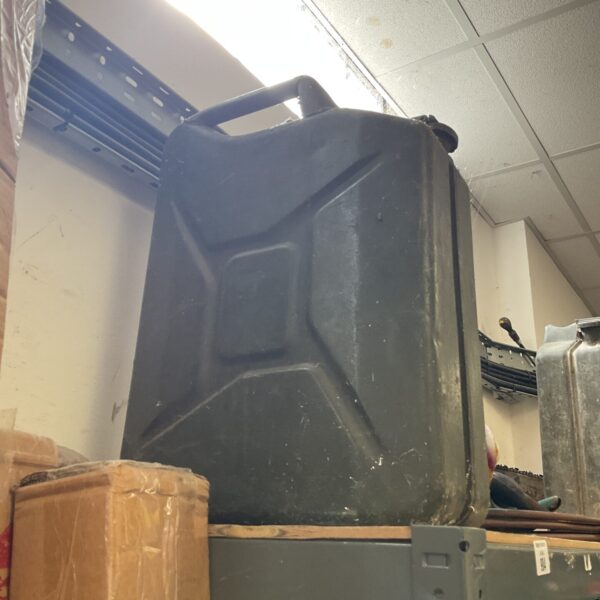 Front view of a vintage military jerry can.