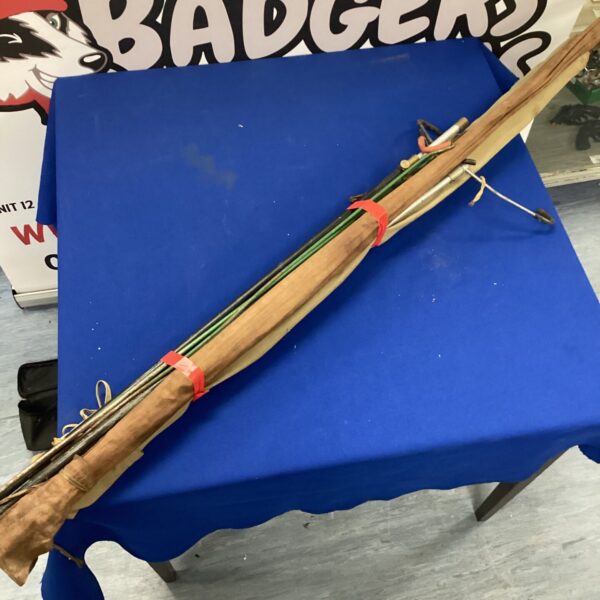 Vintage split cane fishing rods and rod rest bundle for collectors.
