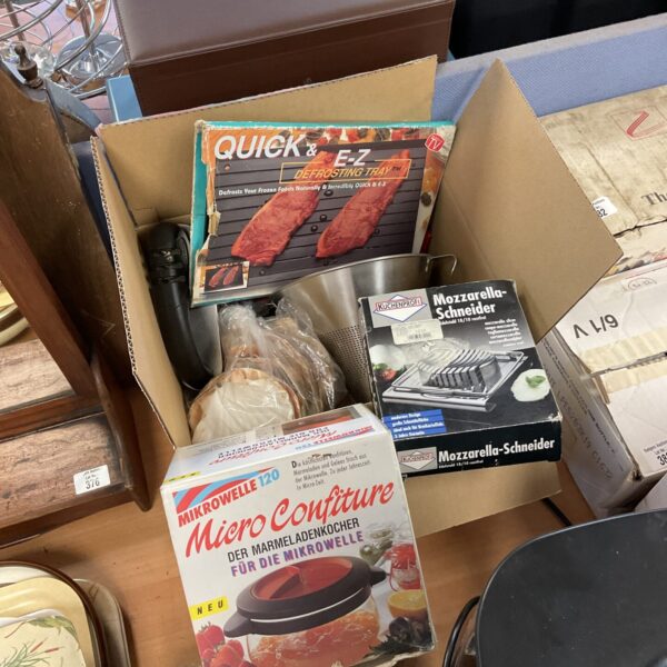 Kitchen accessories lot including mozzarella shredder and defrost tray.