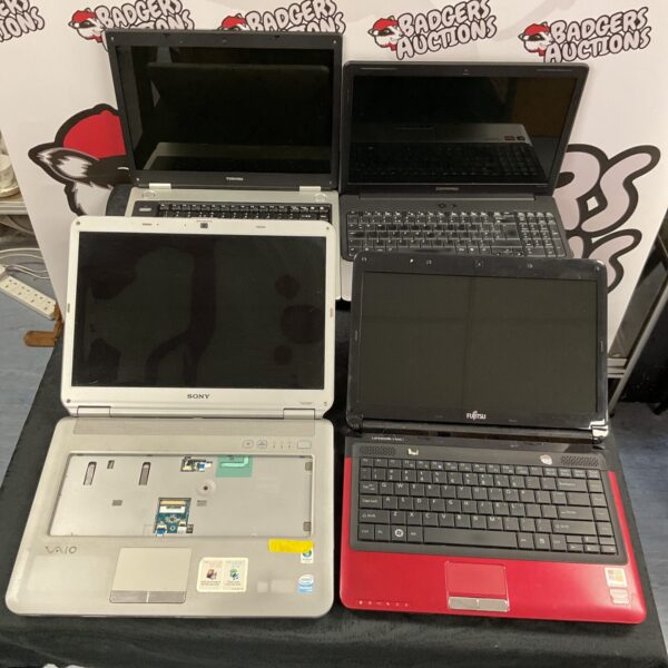 Lot of four laptops for spares or repair.