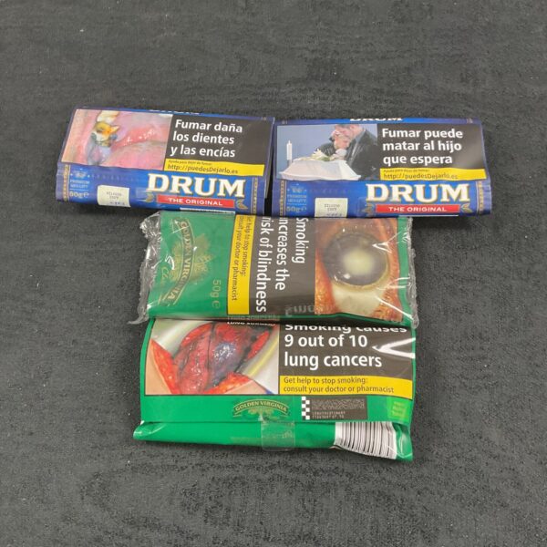 Sealed pouches of Drum and Golden Virginia tobacco for collectors.