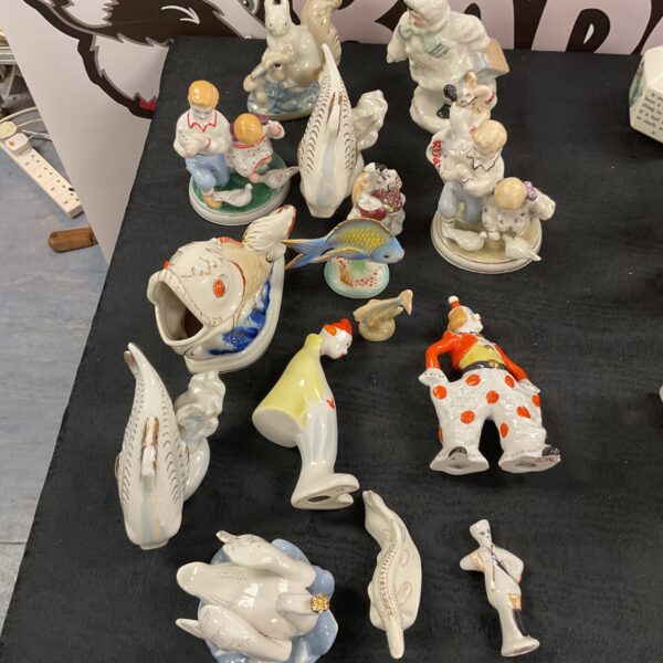 Vintage Russian porcelain figurines in a collectible lot.