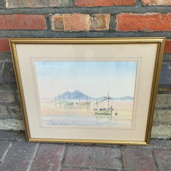 Signed watercolour painting of boats in Puerto Pollenca harbour.