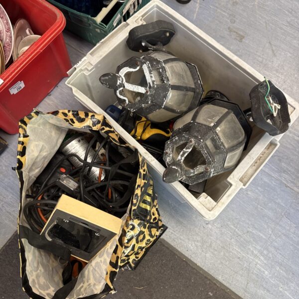Mixed automotive lot with headlight and car parts.