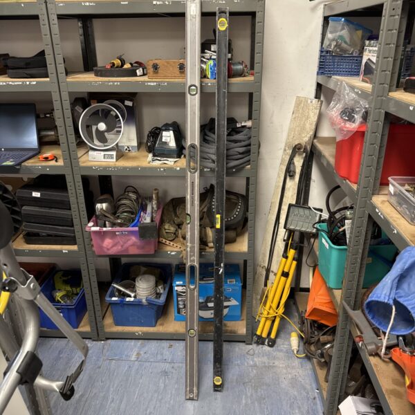 Two large spirit levels, including a Stanley Fatmax, for accurate measurements.