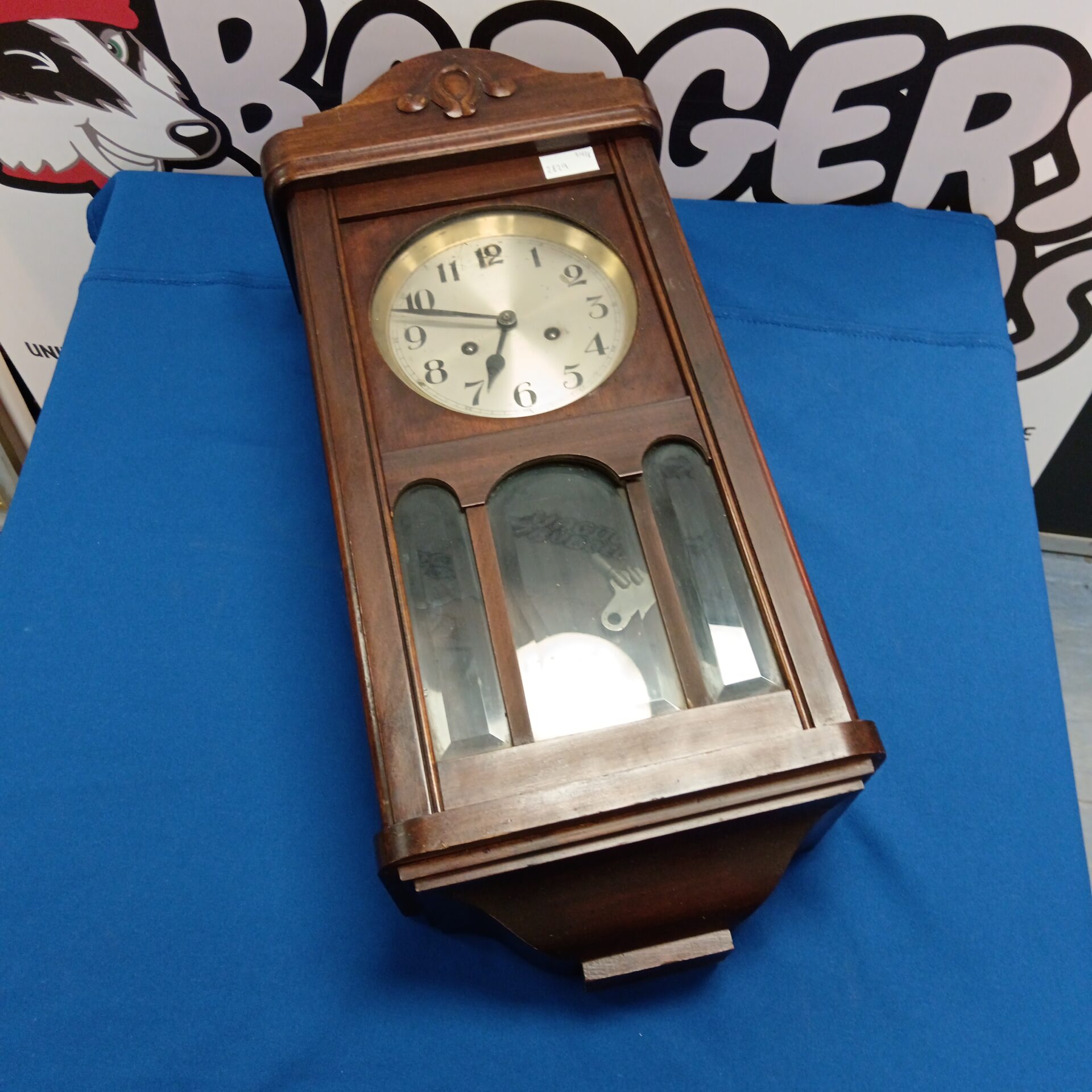 688 Antique oak cased wall clock with pendulum & keys