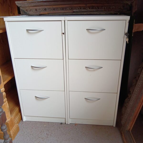 Pair of white wooden filing cabinets for office storage.