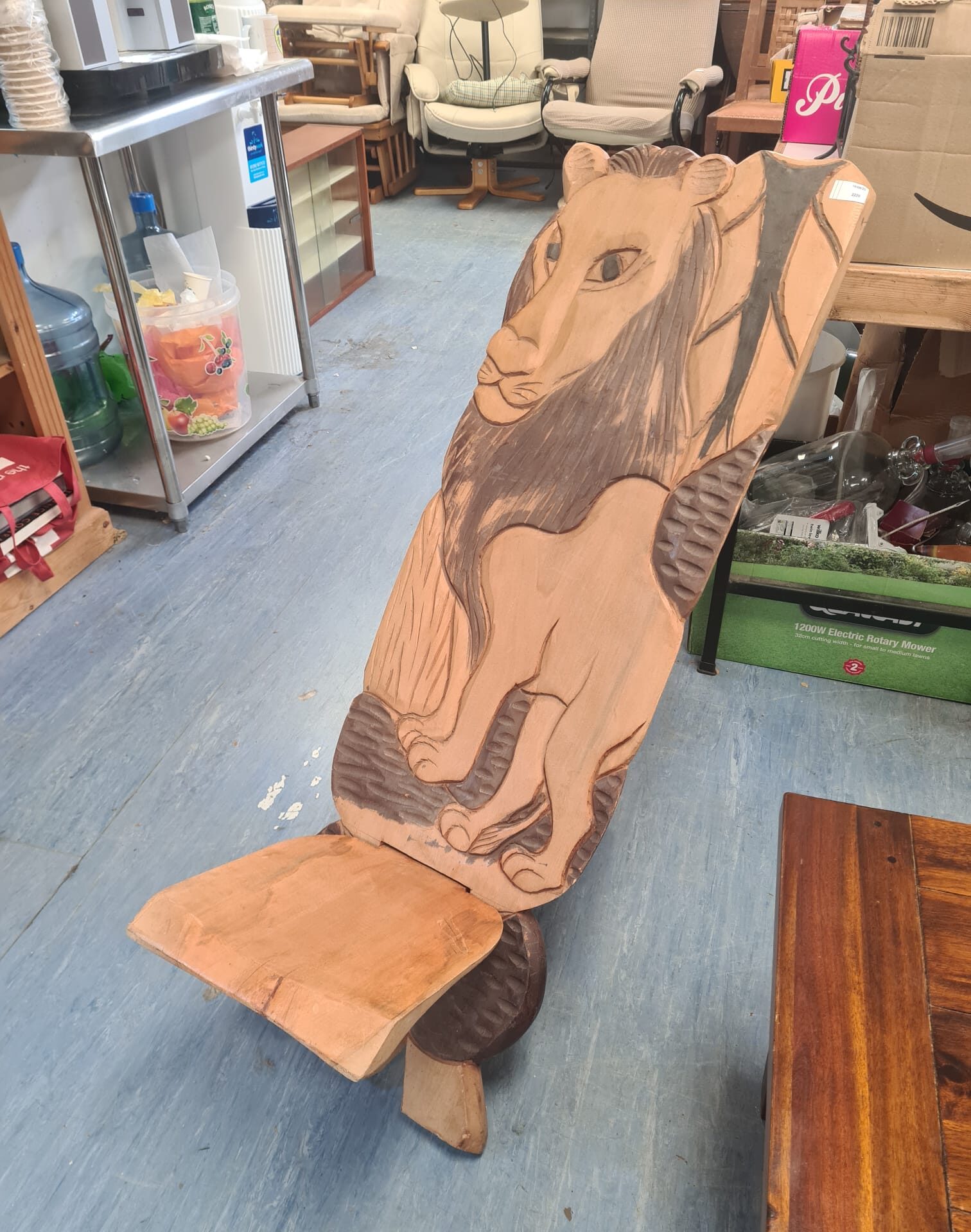 436 Carved African wooden lion chair