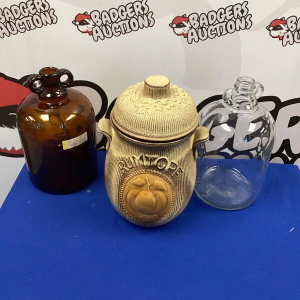 Vintage German Rumtopf jar with two demi johns for fruit preservation.