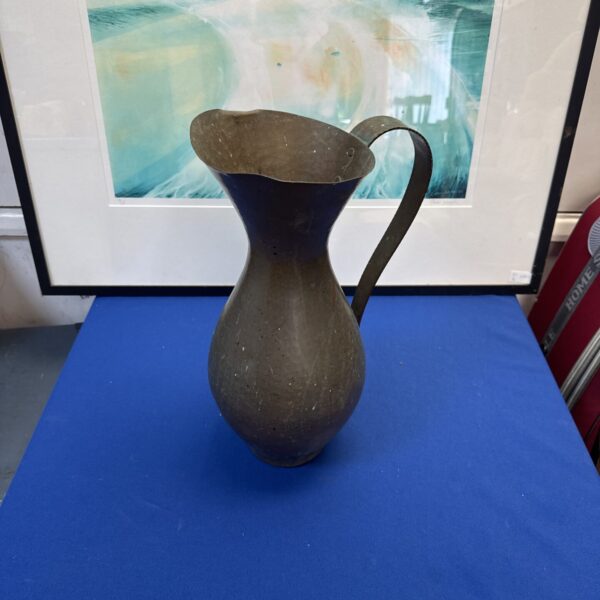 Large vintage Zint Handarbeit copper jug with aged patina.