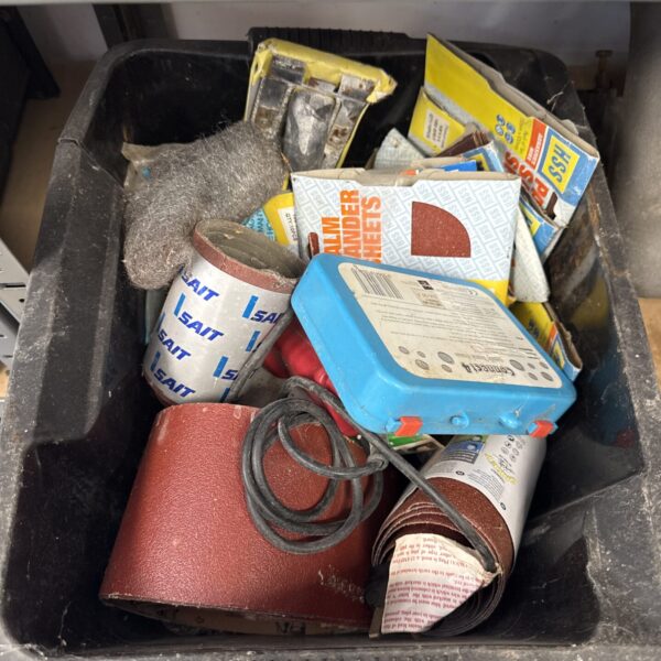 Assorted tools and materials from a shed clearance lot.